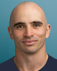 a man with shaved head
