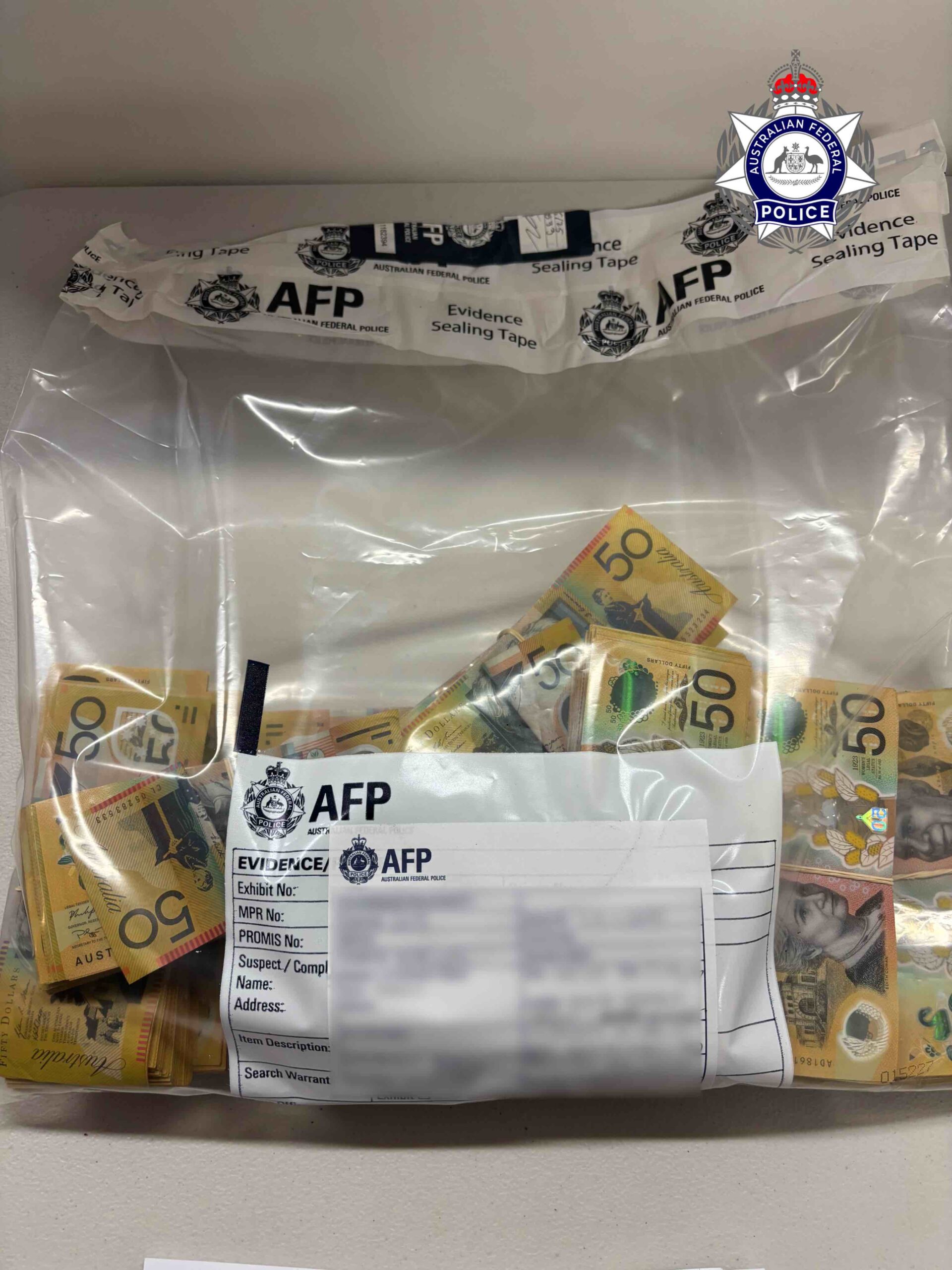 Approximately $100,000 in cash was seized from a Pakistani national at Perth airport on June 19, 2025. Photo: AFP