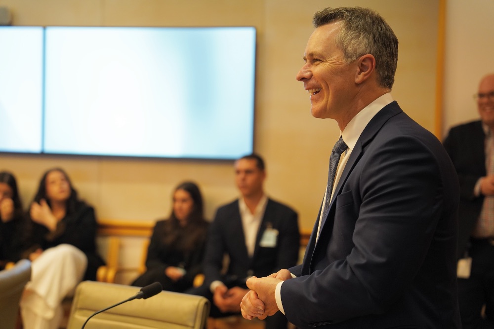 man in suit talking
