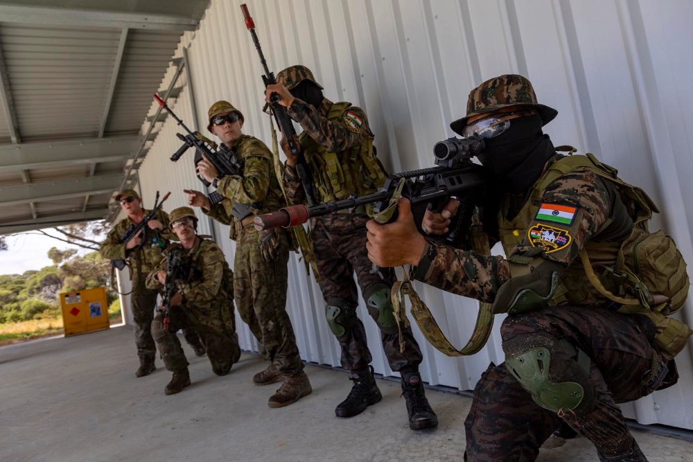 men in army uniform pointing guns
